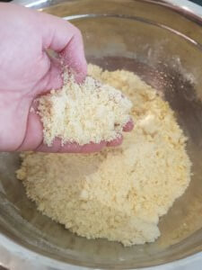 Rubbing in the butter to the Raspberry and White Chocolate Scone mix