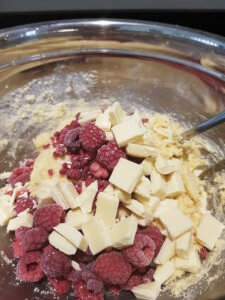Adding the Raspberries and White Chocolate to the dough