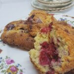 A plate with Raspberry and White Chocolate Scones