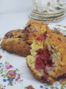 A plate with Raspberry and White Chocolate Scones